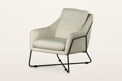 Montelupone accent chair in Taupe, three-quarter view on a warm white studio backdrop: an upholstered shell with low sloping