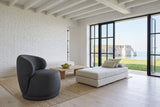 Monterubbiano accent chair in Charcoal twill seen from above in an Etretat clifftop house in Normandy
