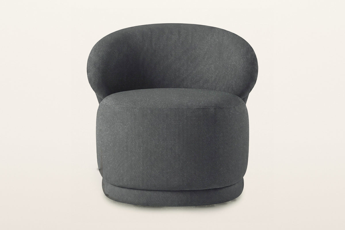 Monterubbiano accent chair in Charcoal twill, straight front view on a warm white studio backdrop: the rounded back above a r