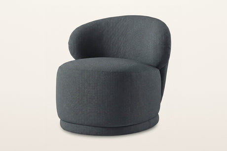 Monterubbiano accent chair in Charcoal twill, three-quarter view on a warm white studio backdrop