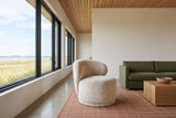 Monterubbiano accent chair in Natural velvet in a Manitou Beach house in Saskatchewan, limewash walls