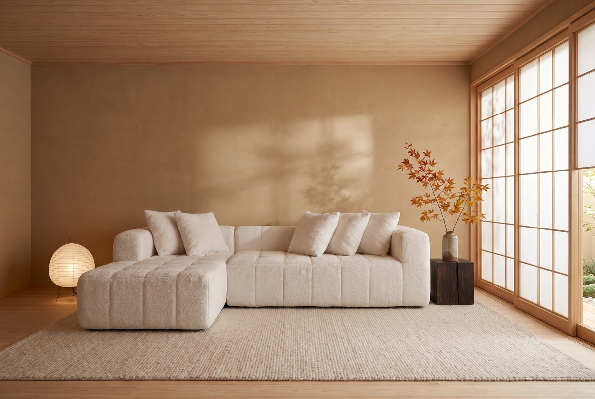 Nembo Boucle Cloud Sectional against a clay plaster wall in a Kyoto townhouse living room beside paper shoji screens, a paper lantern by the chaise and maple leaves in a stoneware vase by the arm