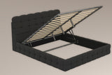 Nemi in black bouclé with the slatted platform lifted on two gas struts, showing the open storage space in the base