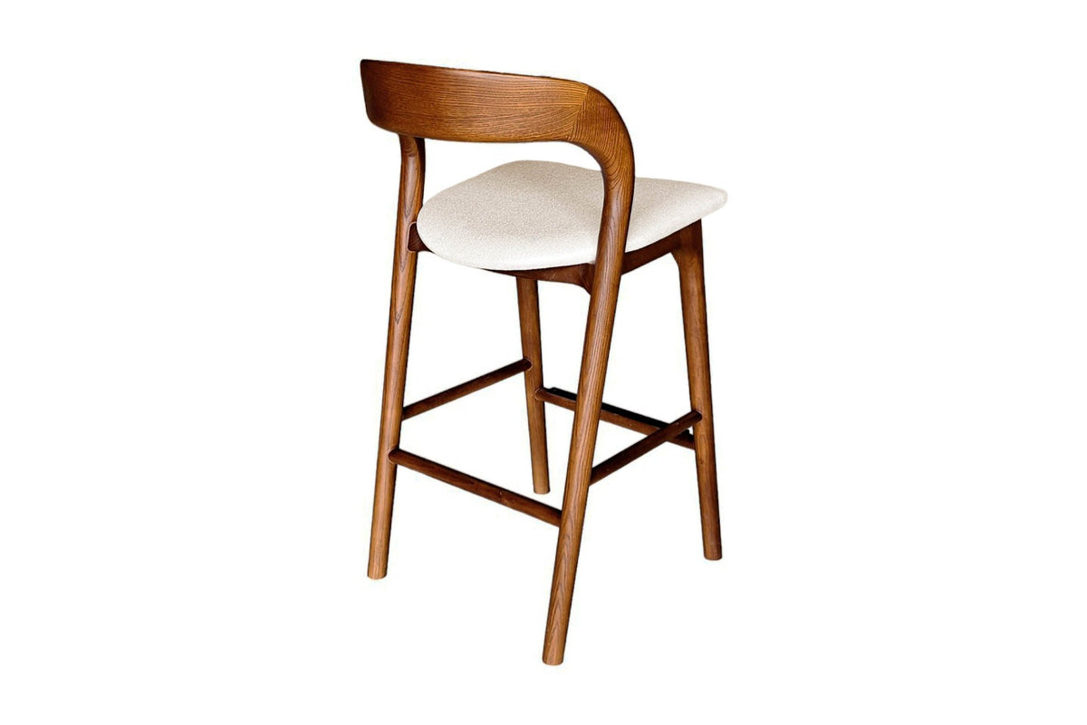 Norwood walnut counter stool, rear three-quarter view of the curved back