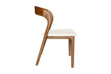 Norwood dining chair, side view of the curved back flowing into the rear leg