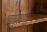 Close-up of a Novella shelf edge and plank back in reclaimed pine