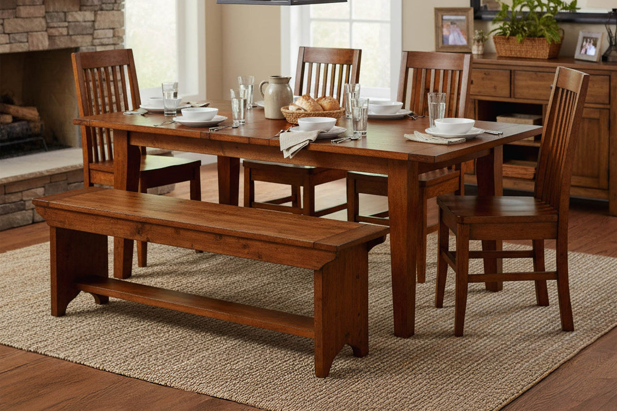 Novella dining table set for dinner with the Novella bench in a farmhouse dining room