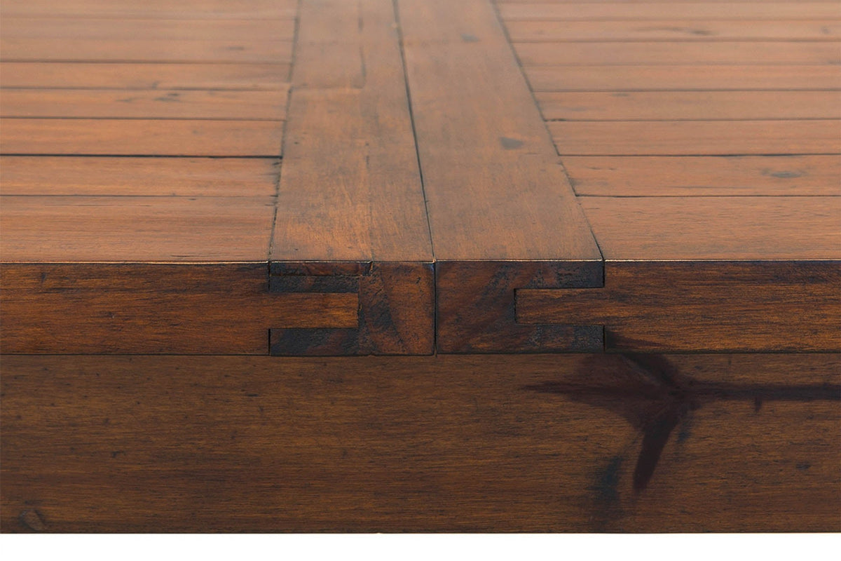Close-up of the Novella tabletop edge with exposed joinery and natural knots