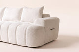 Close-up of one arm of the Nuvola sofa in White, ivory looped boucle