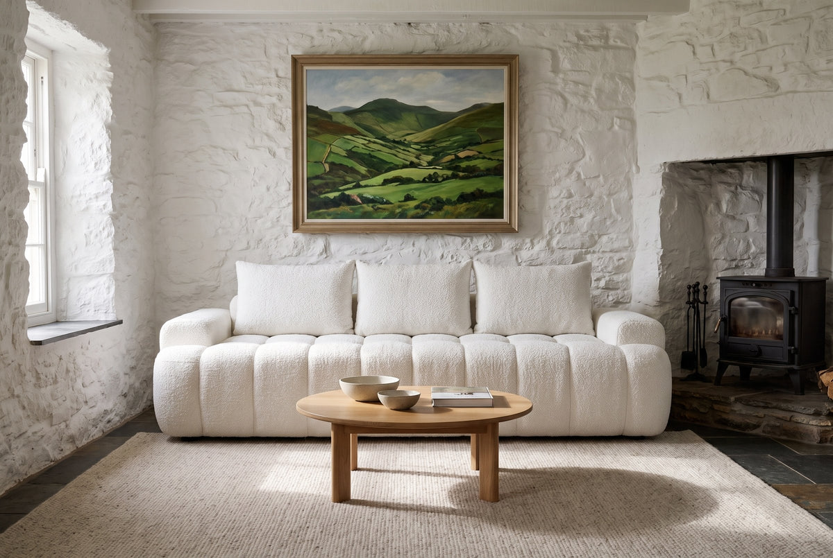 The Nuvola sofa in White in a whitewashed stone cottage in Dingle, Ireland, with a slate floor