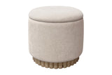 Nyla round storage ottoman in oat fabric on a reeded wood base, front view