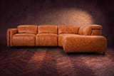 Octavia sectional in Tuscan Cognac on a walnut herringbone floor, seen from the front, footrests closed, Right bumper.
