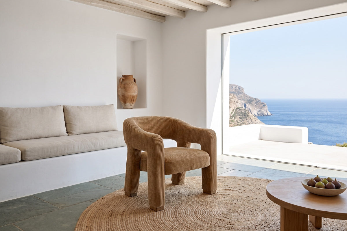 Opi accent chair in Chai in a cliff house on Amorgos, with white lime plaster