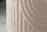 Close-up of the raised arches on the side of the beige Orla ottoman