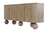 Orson mango wood sideboard in a natural finish with spherical feet, three-quarter view