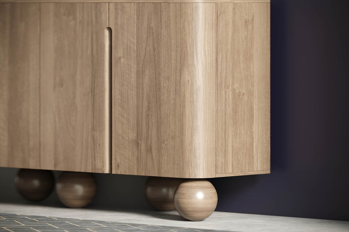 Rounded end and ball feet of the Orson mango wood sideboard