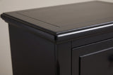 Close-up of the Ortona top corner: the moulded edge, the framed border on the top and the chamfered front corner
