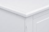 Close-up of the Ortona top corner in White: the moulded edge, the framed border on the top and the chamfered front corner