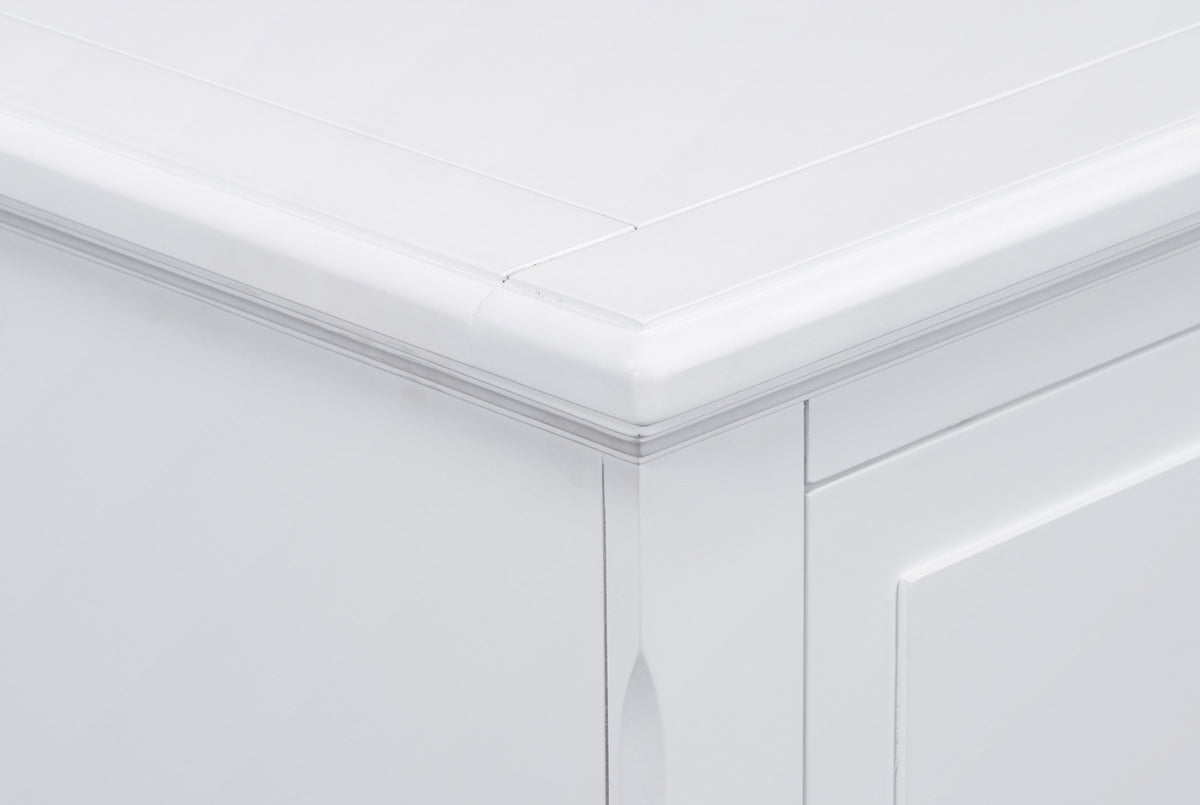 Close-up of the Ortona top corner in White: the moulded edge, the framed border on the top and the chamfered front corner