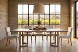 Orvieto dining table in a Napa farmhouse with steel windows onto vineyard rows