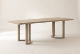 Orvieto dining table in a light ash finish on a pale studio backdrop