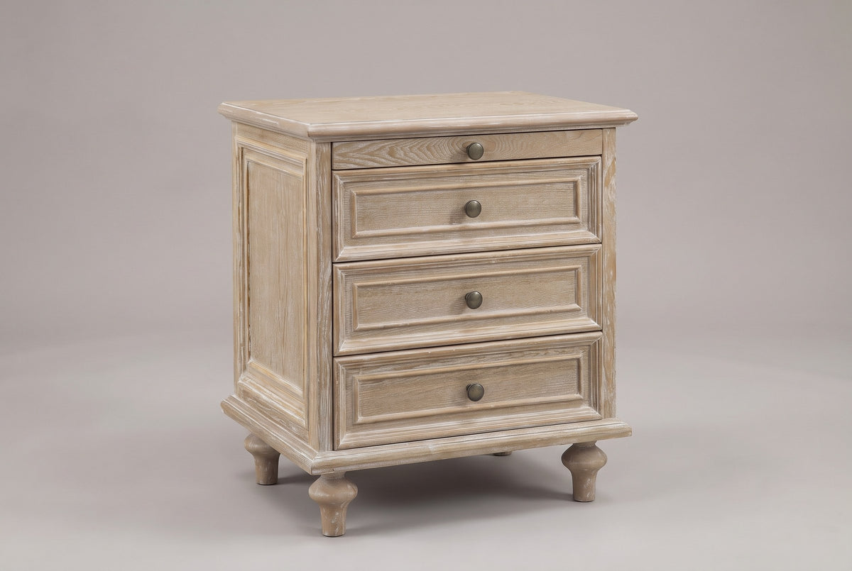Osimo farmhouse nightstand in Natural White, three-quarter view on a warm grey studio backdrop: pull-out tray