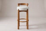 Otricoli bar stool in Ivory, straight front view: round woven seat pad, four square walnut-finish legs