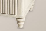 Close-up of the Palestrina base in Beige: the rounded corner post and plinth corner