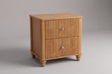 Palestrina fluted nightstand in Natural, three-quarter view on a warm grey studio backdrop
