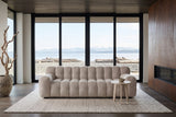 Pergola sofa in Beige facing the glass in a Comox beach house, a dark cedar ceiling