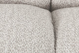 Close-up of the Pergola puffs in Beige: a flecked woven polyester and the deep seams between the rounded channels
