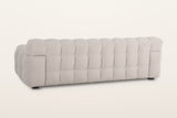 Pergola sofa in Beige from the back at three-quarter on a warm white studio backdrop