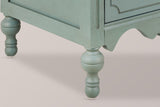 Close-up of a turned gourd leg, the grooved corner post and the scalloped apron of the Perugia nightstand in Aged Blue