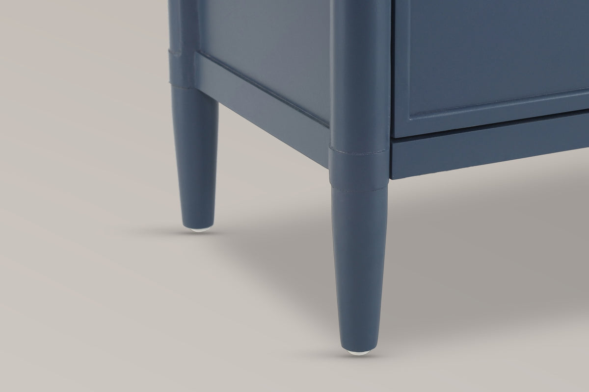 Close-up of a Pescara front leg in Navy Blue: the round corner post with its band joint