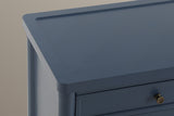 Close-up of the Pescara top corner in Navy Blue: the raised rim and rounded corner of the tray top