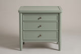 Pescara nightstand in Sage Green, straight front view: a rimmed tray top, three framed drawers with round bronze-tone knobs