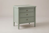 Pescara nightstand in Sage Green, three-quarter view on a warm grey studio backdrop