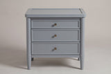 Pescara nightstand in Slate Gray, straight front view: a rimmed tray top, three framed drawers with round bronze-tone knobs
