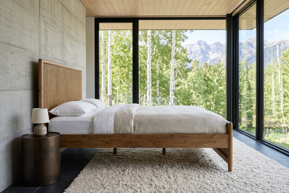 Side view of the Pettorano bed in a bedroom in a Kicking Horse ski house