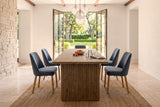 End view of the Pettorano dining table in Brown in a Niagara-on-the-Lake garden house, French doors open to the lawn