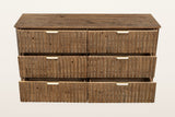 Pettorano dresser in Brown with all six drawers pulled out, front view on a warm white studio backdrop