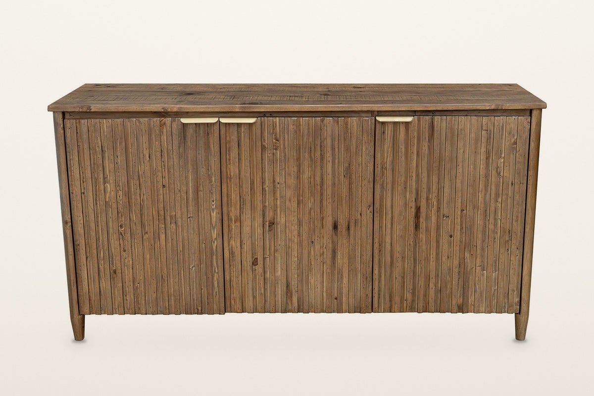 Pettorano sideboard in Brown, straight front view on a warm white studio backdrop: three equal slatted doors