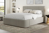 Pierce Queen platform bed in mushroom fabric with white bedding in a bright bedroom