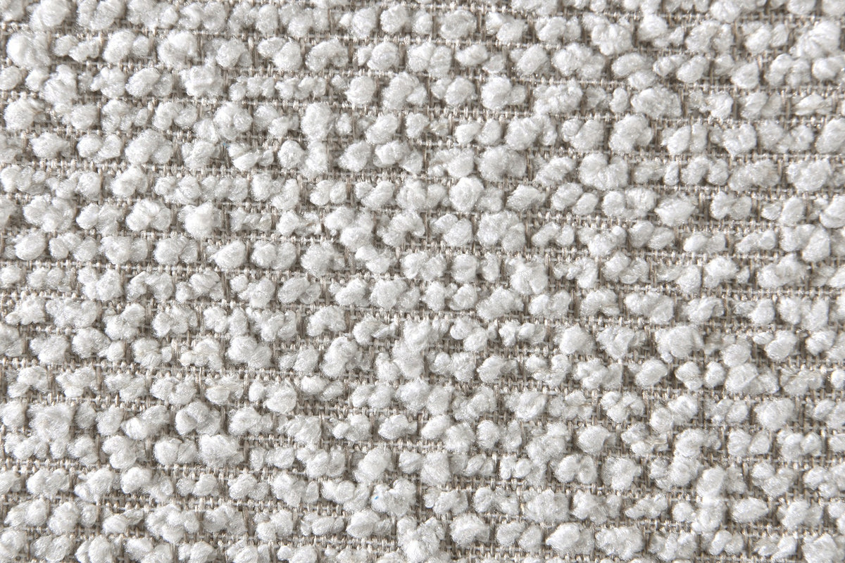 Pierce bed close-up of the nubby two-tone mushroom upholstery fabric