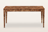 Polcenigo dining table in Dark Burl, front view on a warm white studio backdrop