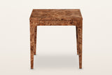 Polcenigo side table in Dark Burl, front view on a warm white studio backdrop