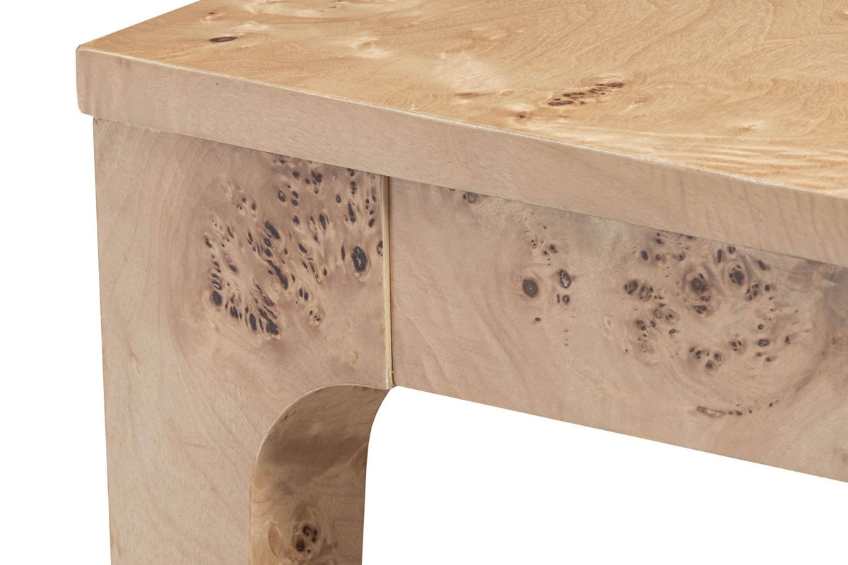 Close-up of a Polcenigo corner in Honey Blonde Burl: the square top edge, burl eyes on the apron