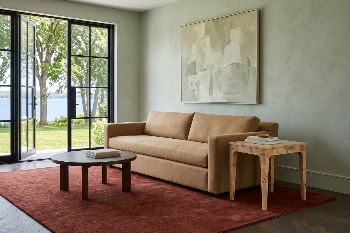 Polcenigo side table in Honey Blonde Burl beside a camel linen sofa in a Rothesay house, with sage plaster walls