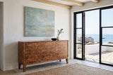 Polcenigo sideboard in Dark Burl against white lime plaster under oak beams in an ocean house in Matosinhos