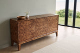 Polcenigo sideboard in Dark Burl seen from above against a sage-grey limewash wall in a Rimouski house